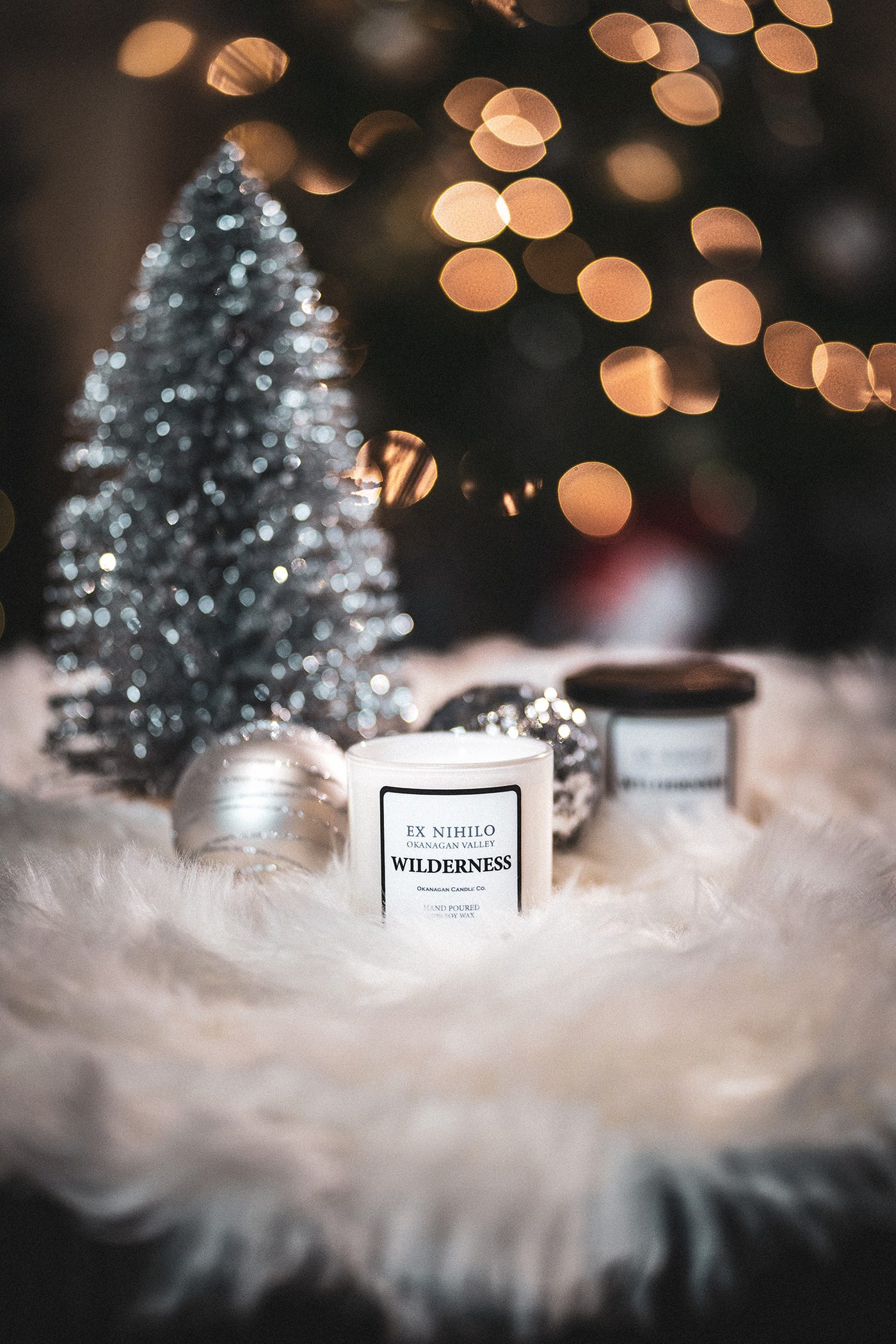 Candle in a festive holiday setting